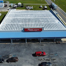 10-Year-Uniflex-Acrylic-Waterproof-System-over-the-metal-roof-at-Roses-in-Alma-GA 1