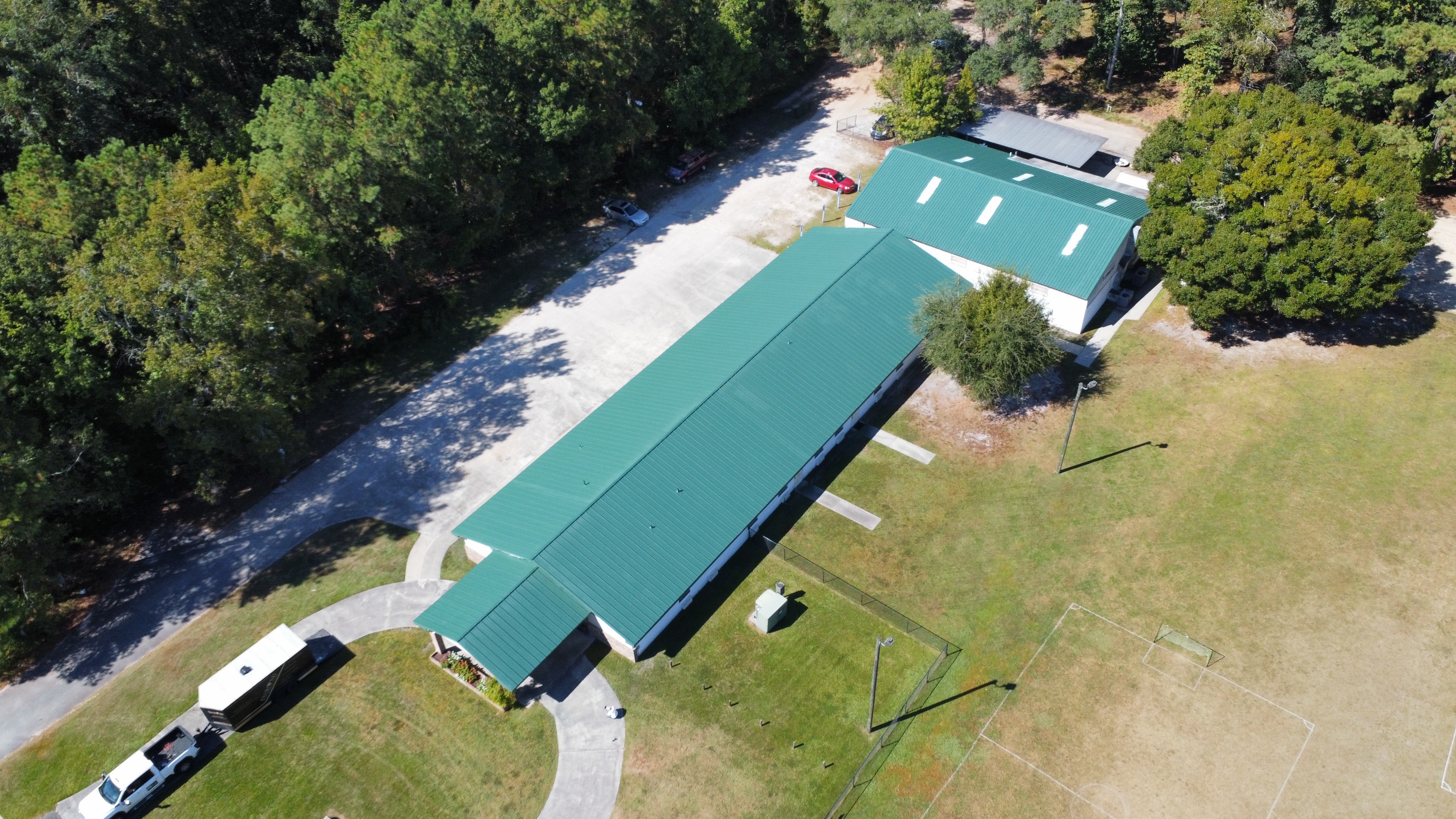 Commercial Roof coating Hinesville YMCA gymnastics building 