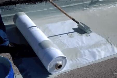 Fabric reinforced roofing